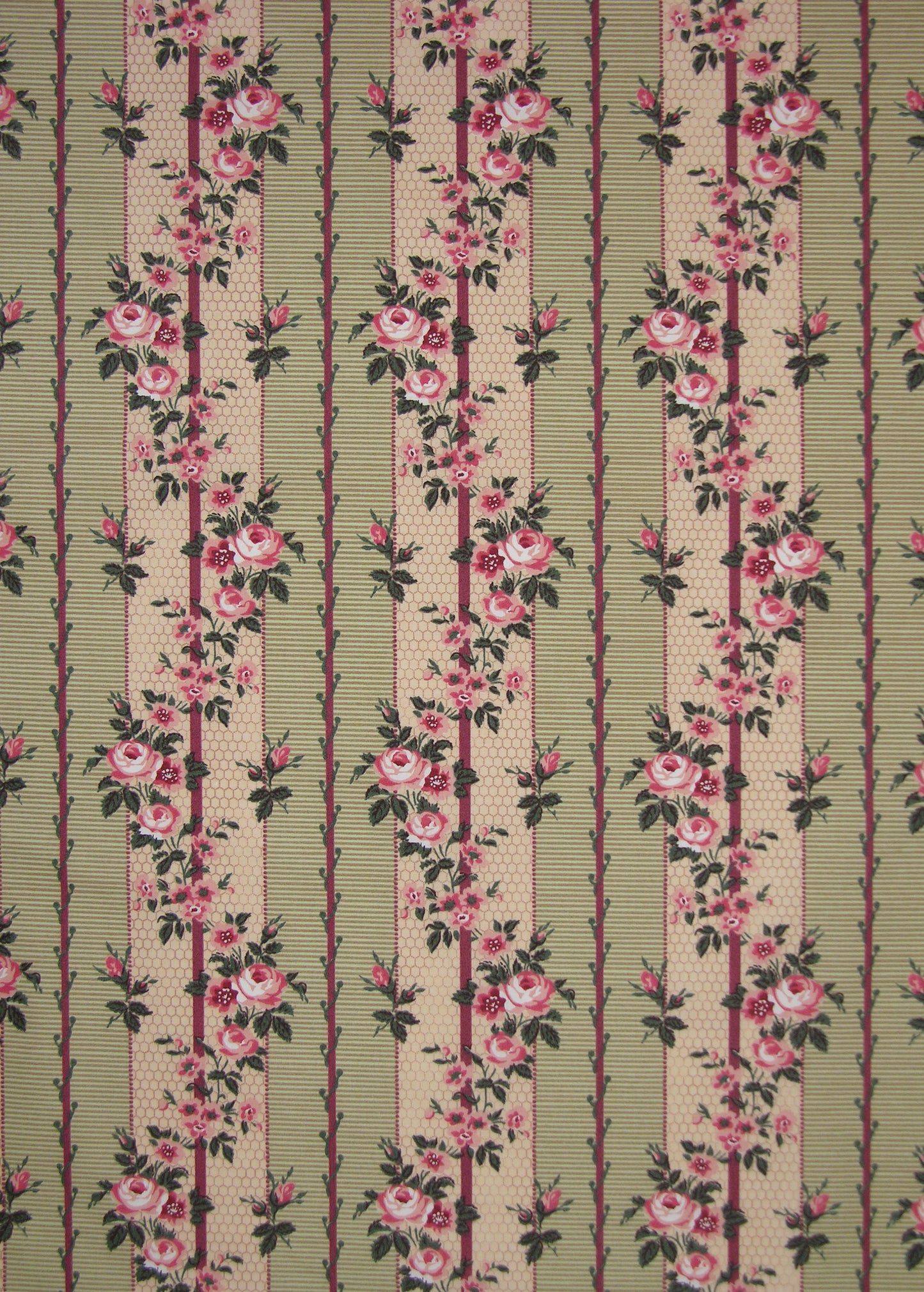 green striped fabric with printed roses and vines entwining the stripes