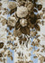 printed fabric that depicts a dark brown floral bouquet over blue stripes
