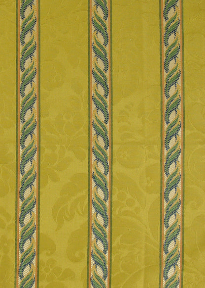 golden yellow fabric with a damask pattern and vertical stripes