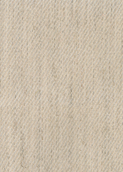 close up of a twill upholstery fabric in cream