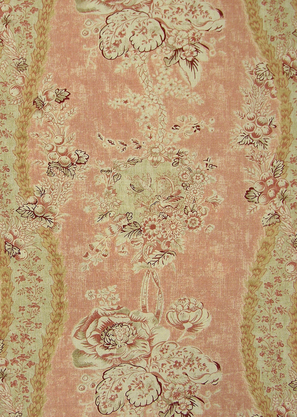 pink fabric with a monochromatic pattern of florals, vines, and berries