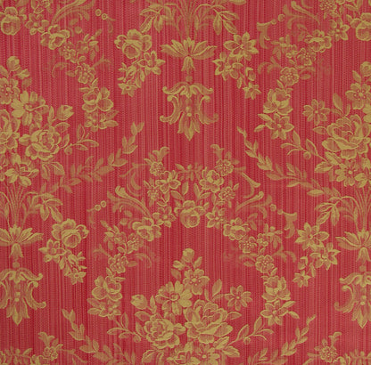 a red fabric with a gold floral damask pattern woven into its design