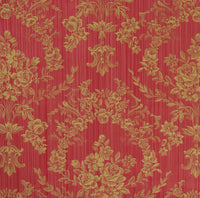a red fabric with a gold floral damask pattern woven into its design
