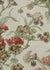 natural linen fabric printed with muted flowers in green and red