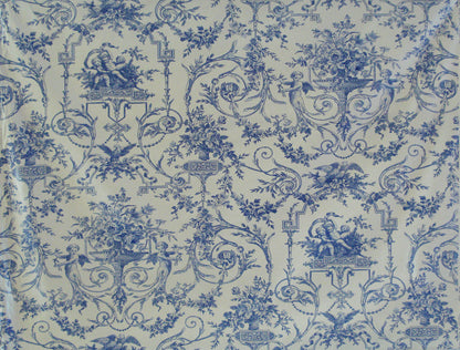 a blue and white vintage toile fabric