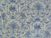 a blue and white vintage toile fabric