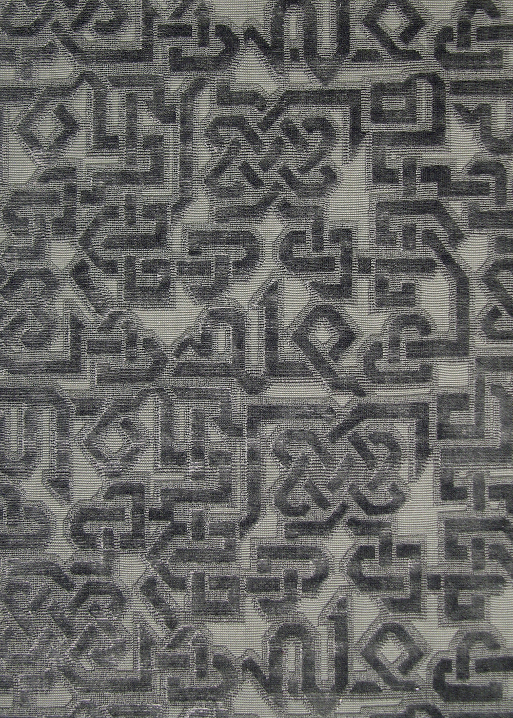 charcoal velvet fabric with a geometric lattice design