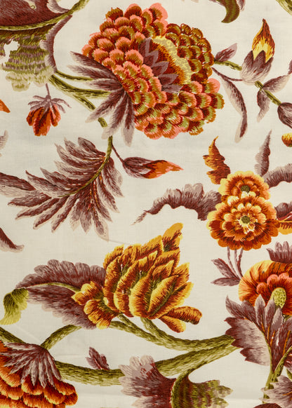 orange indian-inspired botanical printed fabric with a cream background
