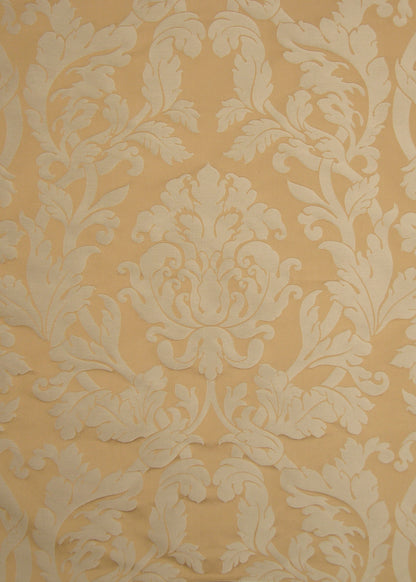 creamy light orange  satin fabric with a subtle damask pattern
