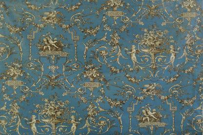 a blue and gold vintage toile fabric