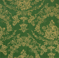 a green fabric with a gold floral damask pattern woven into its design