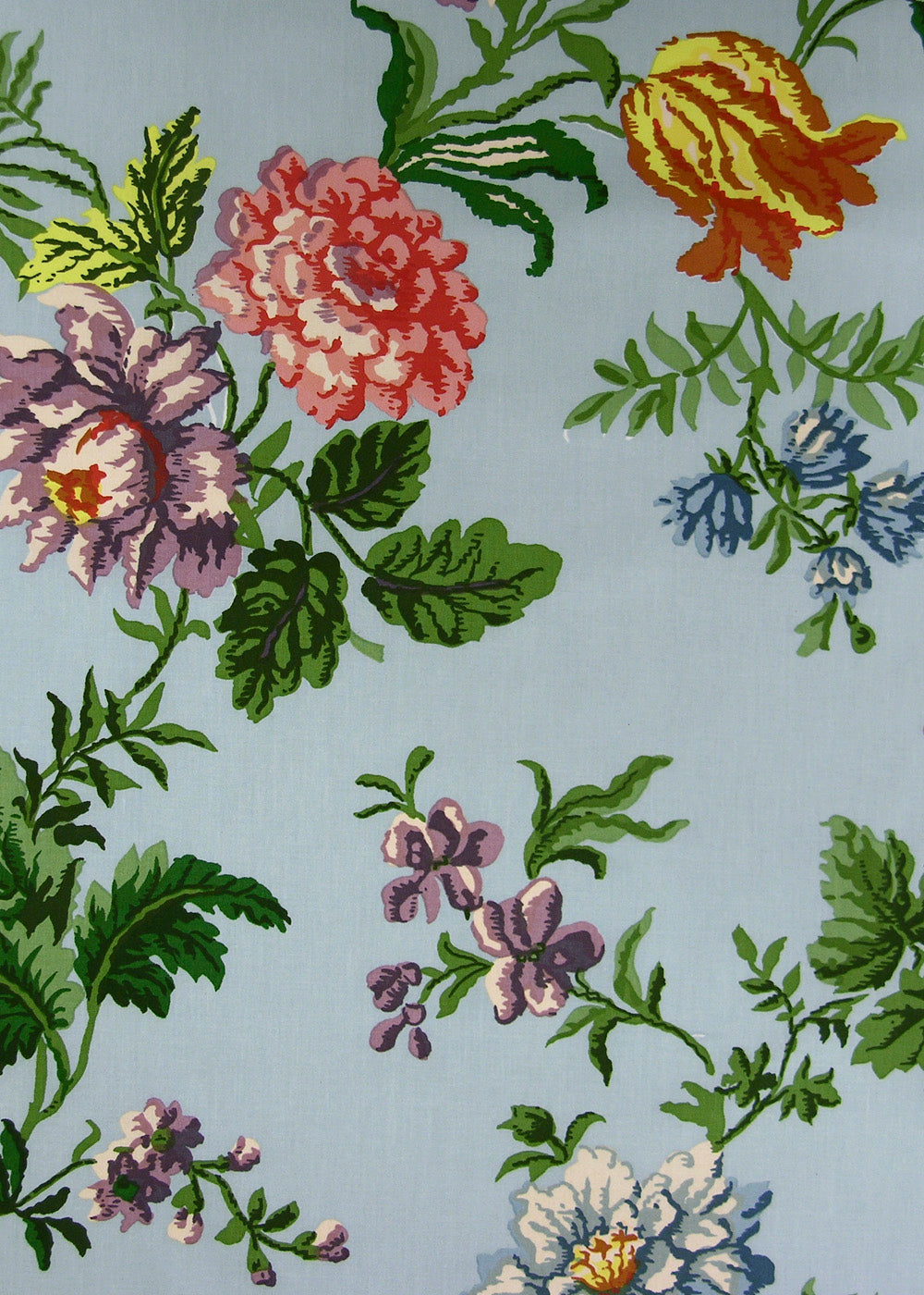 sky blue fabric printed with a sparse but colorful floral print