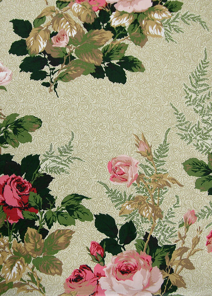 chintz fabric printed with roses over a cream swirled background