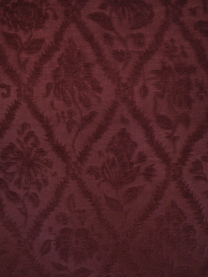 deep burgundy red velvet with a rose and trellis pattern