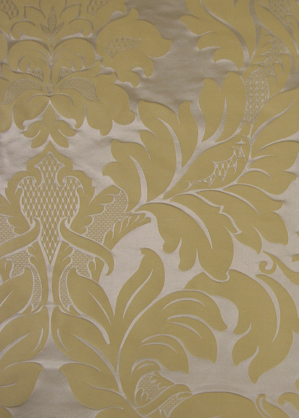 silver satin fabric with a gold damask pattern