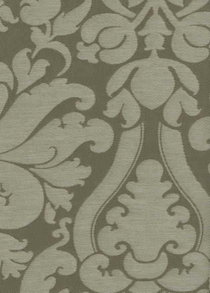 green fabric with a woven damask design