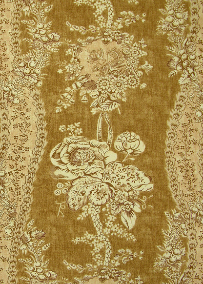 yellow fabric with a monochromatic pattern of florals, vines, and berries
