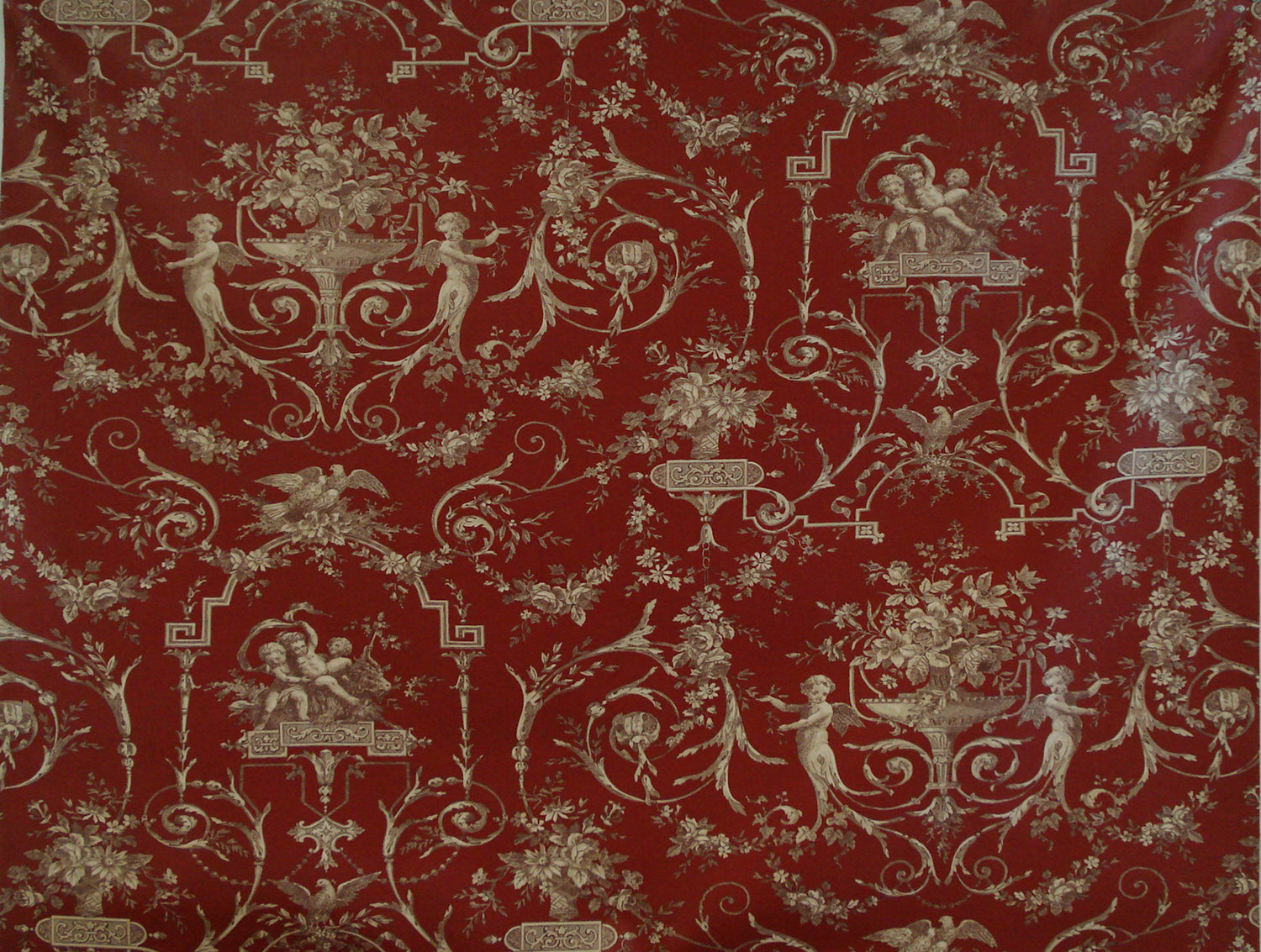 a red and gold vintage toile fabric