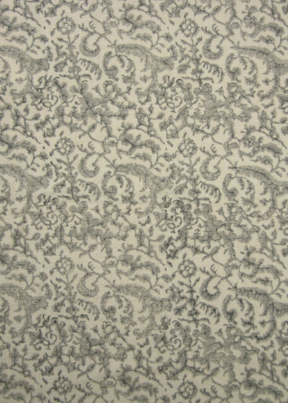 dusty blue  and natural fabric with a small-scale floral block print
