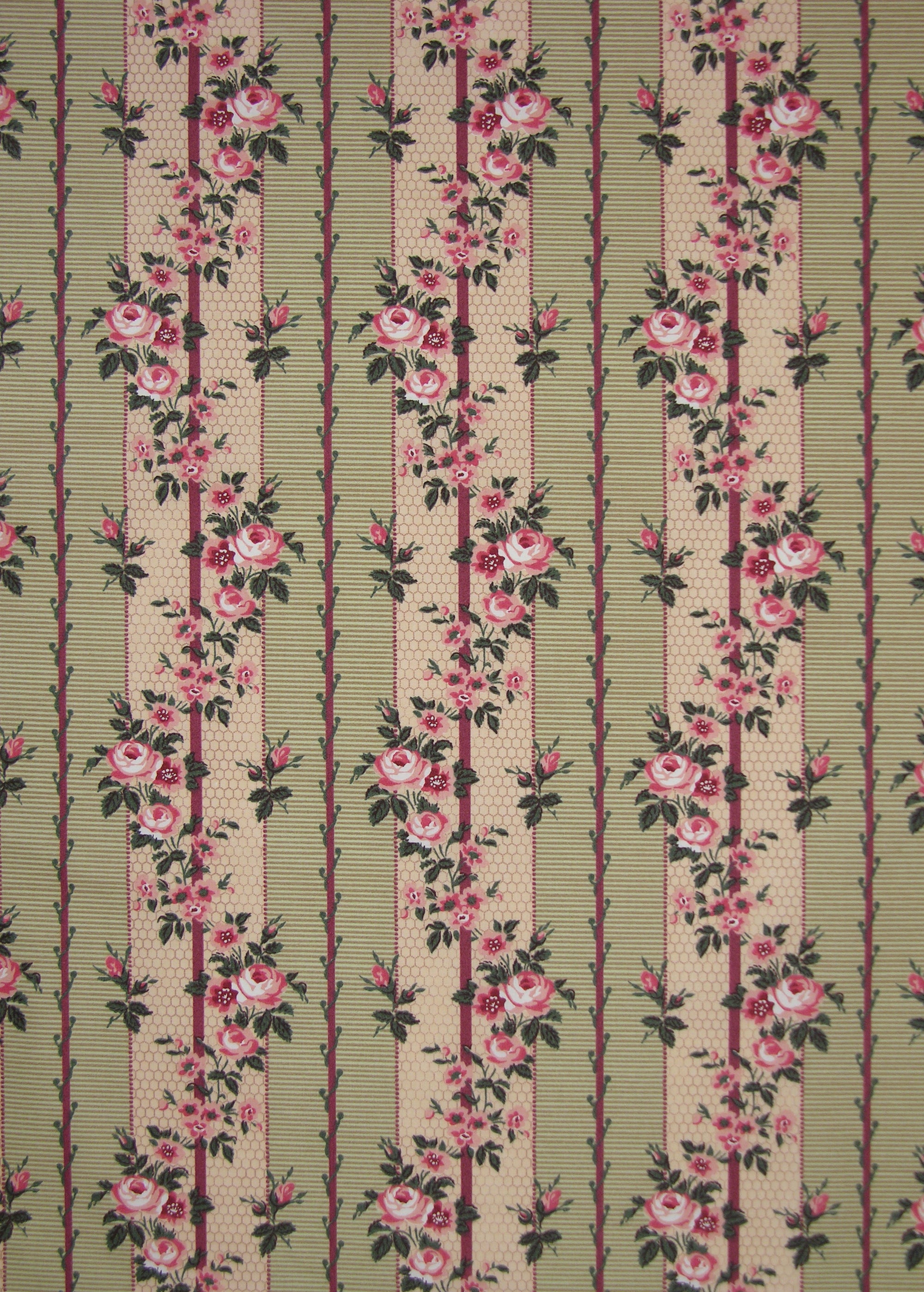 green striped fabric with printed roses and vines entwining the stripes