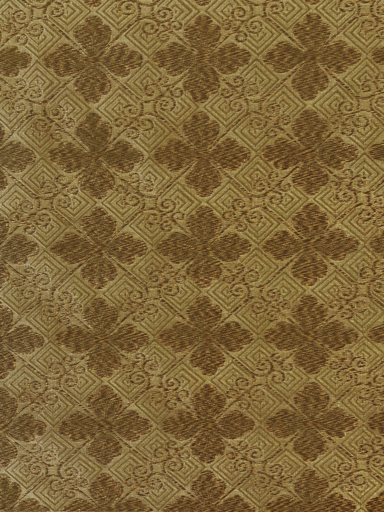 golden and camel woven fabric with a tiled geometric design