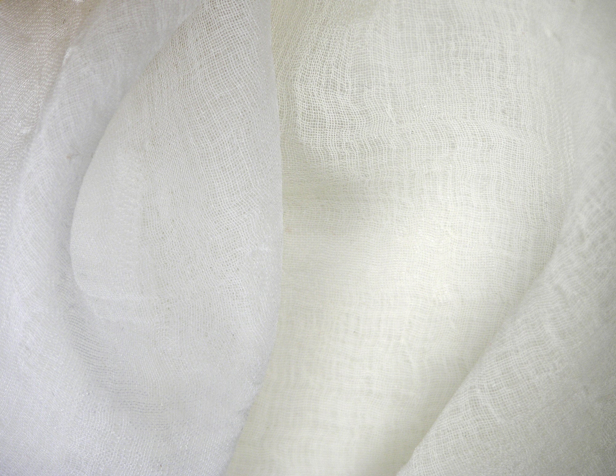 lightly rumpled sheer fabric with a loose weave