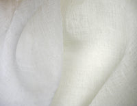lightly rumpled sheer fabric with a loose weave
