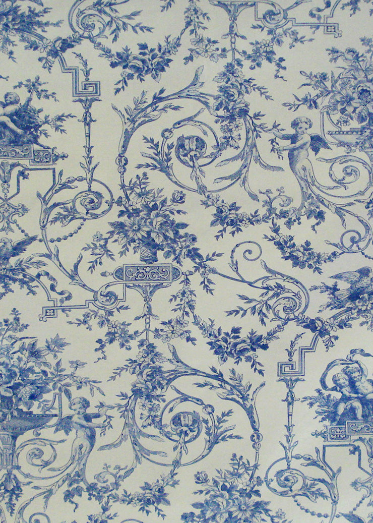 a blue and white vintage toile fabric