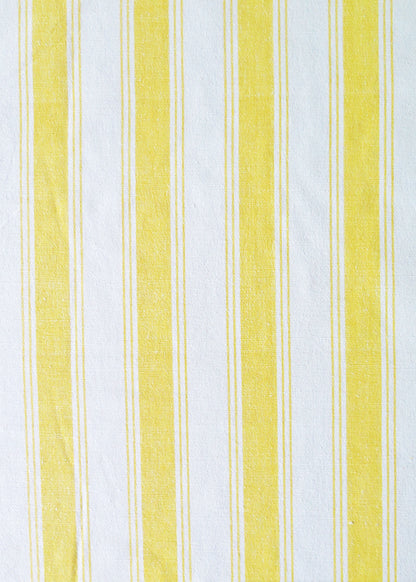 fabric with a yellow and white vertical awning stripe