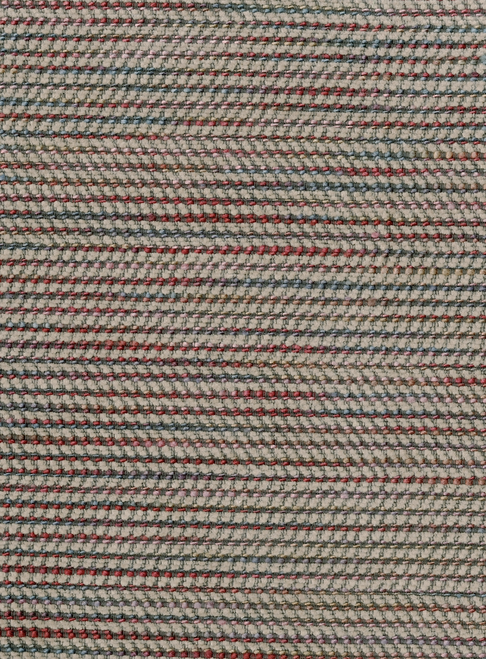 woven fabric with brown, pink, red, blue, and yellow tones