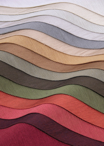 multicolored stack of fabrics with diagonal ribbed texture