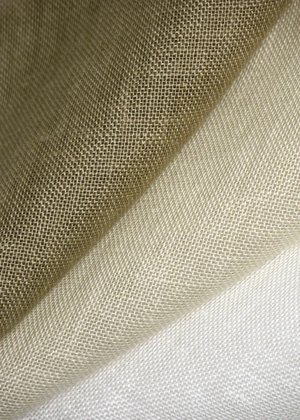 close up of woven linen fabric in several colors
