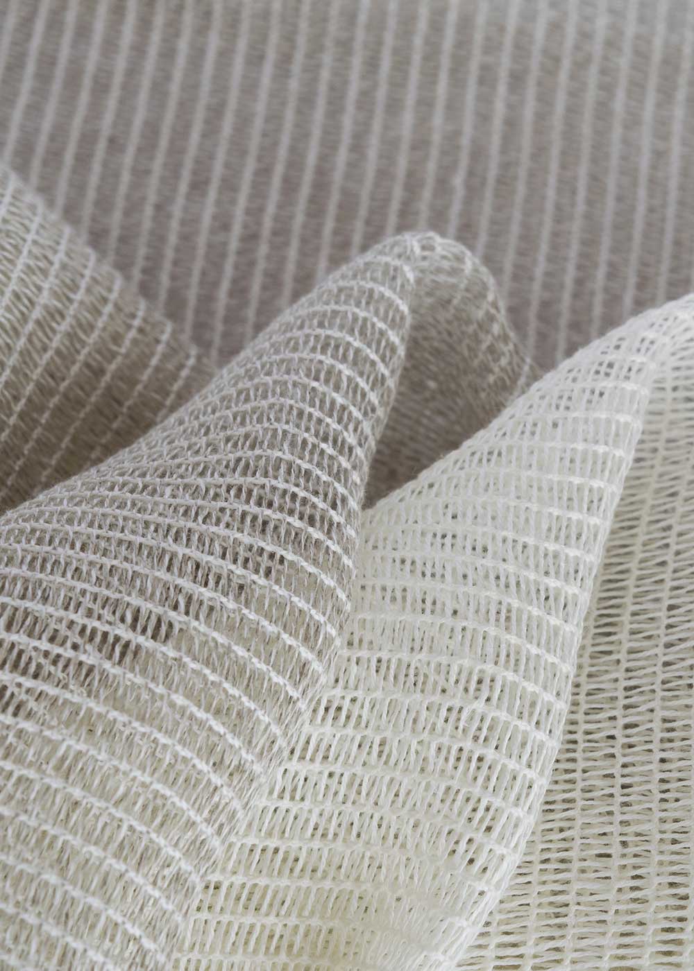 close up of sheer fabric that looks like netting