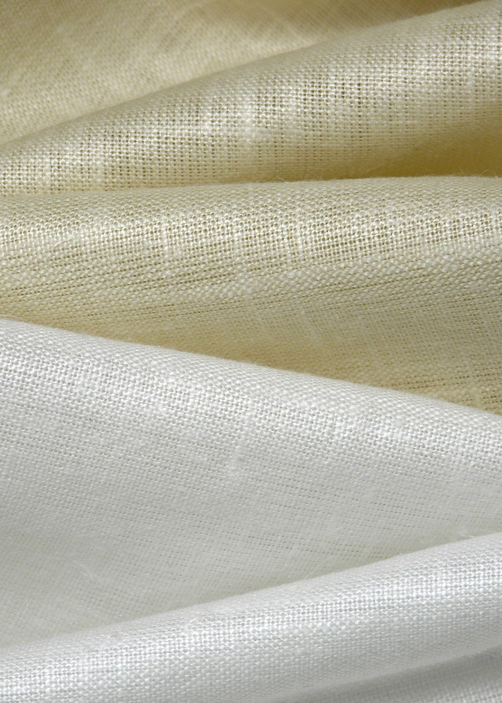 several sheer neutral fabrics with a luminous finish