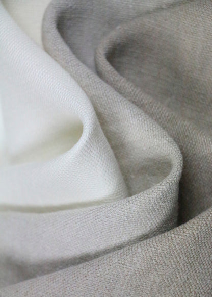 close up of linen upholstery fabrics in shades of grey