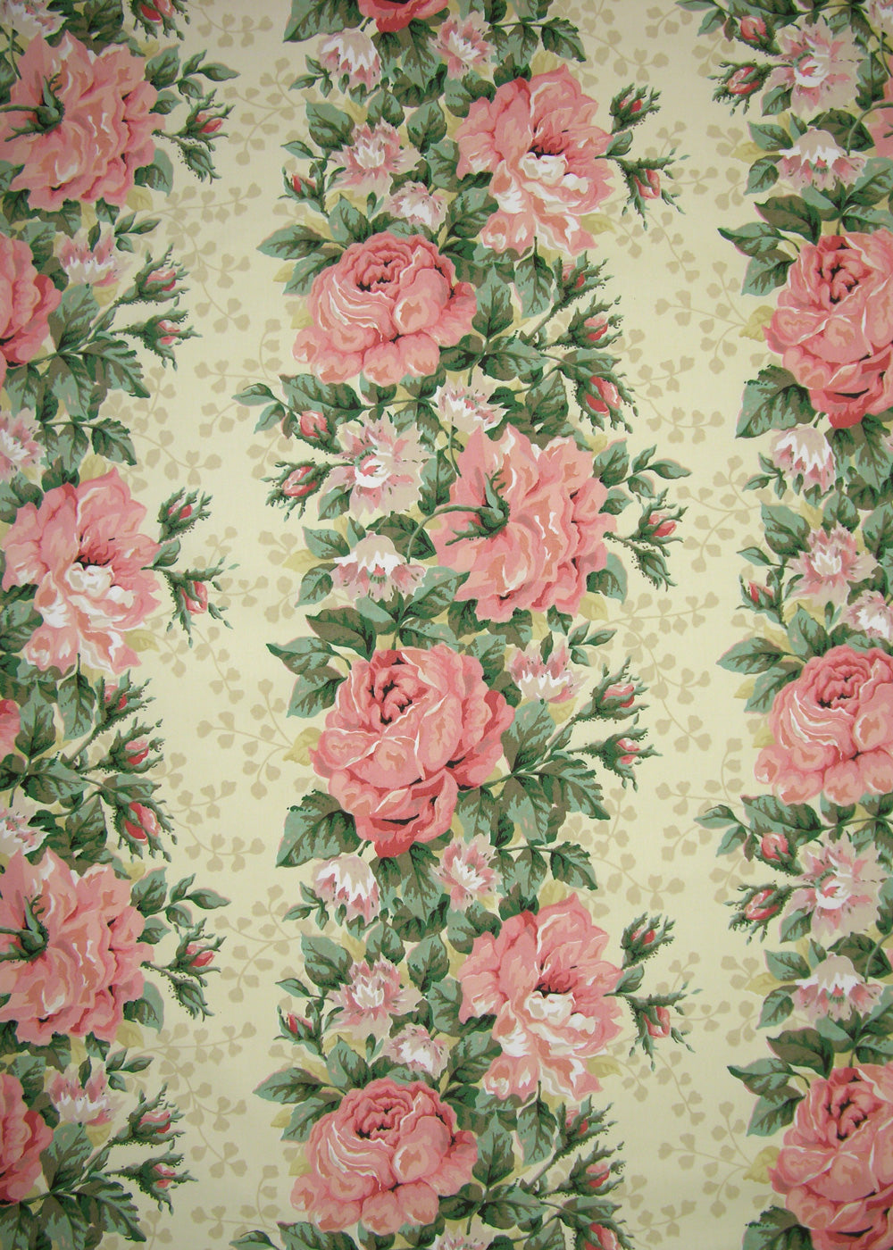 buttercup yellow fabric with vertical stripes made up of pink florals