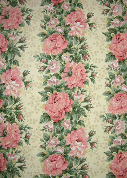buttercup yellow fabric with vertical stripes made up of pink florals