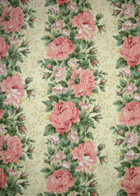 buttercup yellow fabric with vertical stripes made up of pink florals