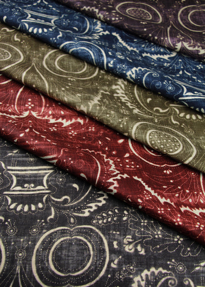 folded stacked fabric with swirling patterns