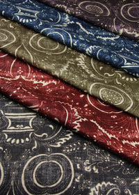 folded stacked fabric with swirling patterns