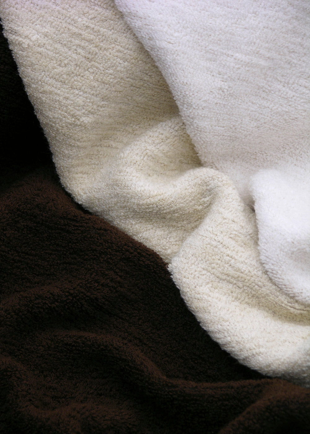 crumpled trio of plush terrycloth outdoor fabric