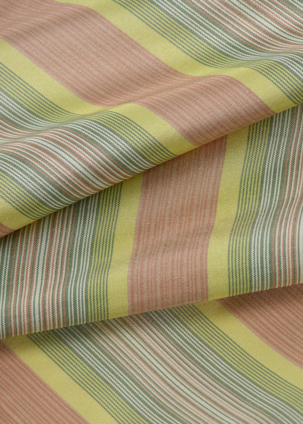 rainbow striped fabric softly draped over itself
