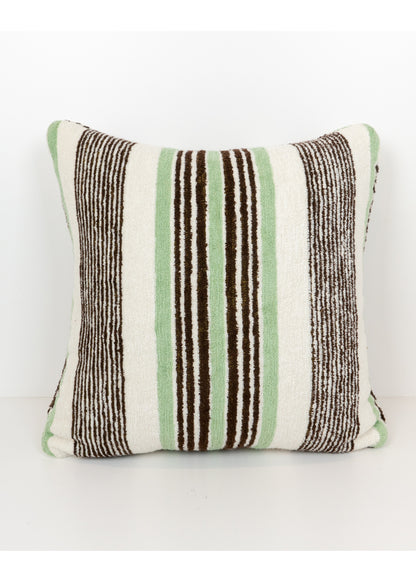 outdoor-friendly terrycloth pillow with black, white, and green stripe